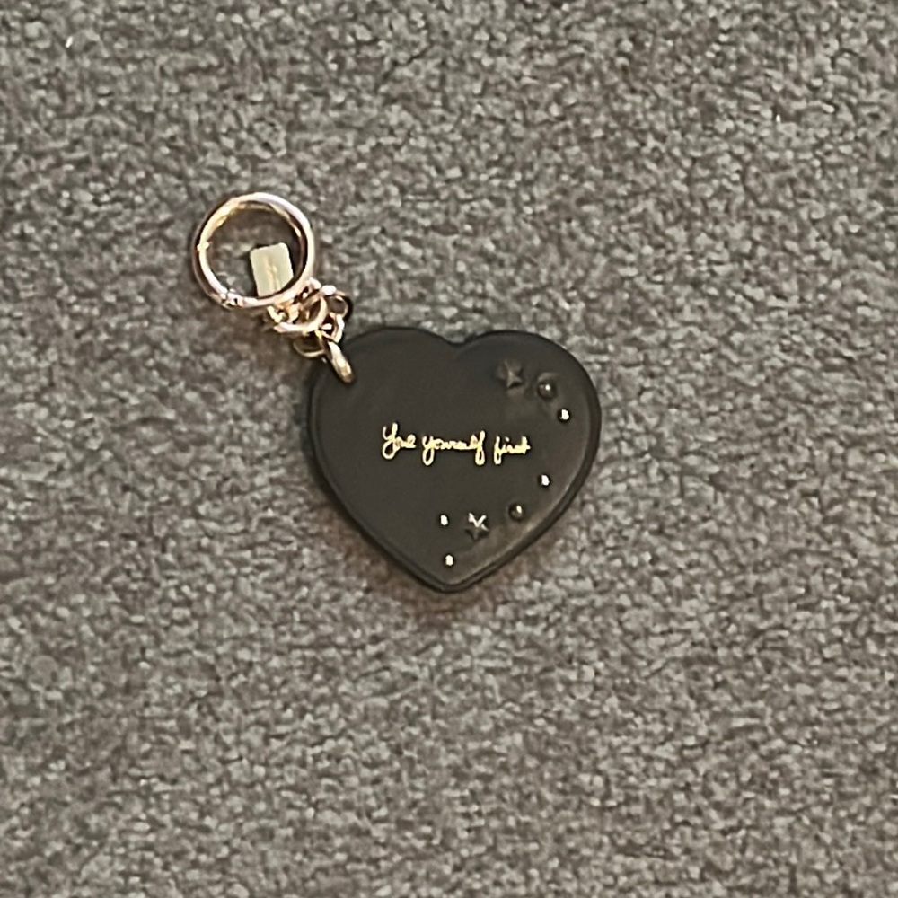 Coach X Selena Gomez black and gold “love yourself first” key chain